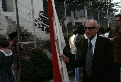 Wendell Wilcox holding the Singapore flag